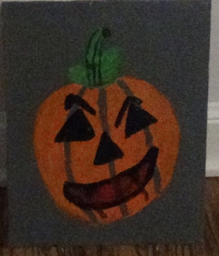 Glowing Vampire Jack-O-lantern (glow in the dark with blacklight)
